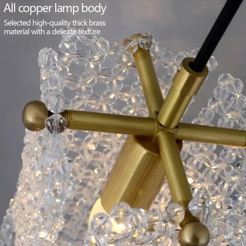 Luxury gold crystal tassel pendant lamp with a gold-toned brass body and clear crystal beads for bedside decorbites lighting