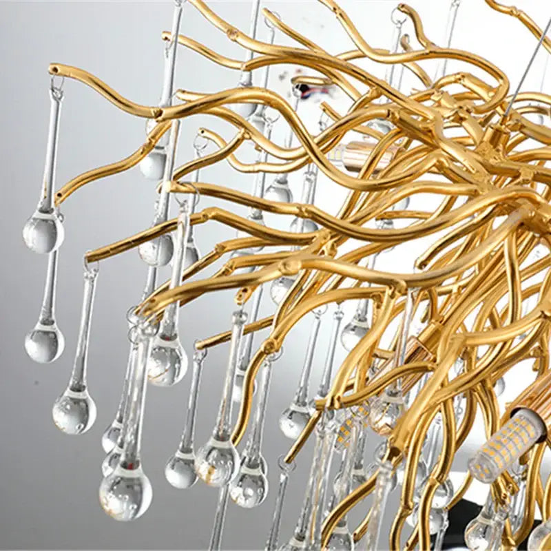 Luxury gold crystal water drop chandelier with branch-like design and clear teardrop glass pendants for dining room decorbites crystal water drop lighting