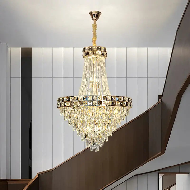 Luxury gold decorbites crystal chandelier with cascading crystal droplets and decorative faceted crystals for living room