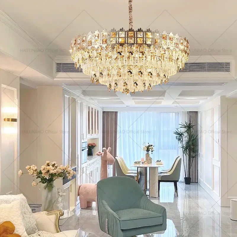 Luxury gold decorbites crystal chandelier with cascading faceted glass tiers and intricate metalwork for living room
