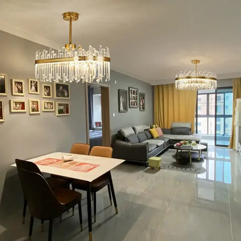 Luxury gold decorbites crystal chandeliers with cascading crystal prisms for elegant dining room lighting