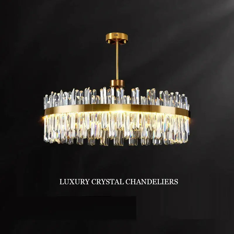 Luxury gold decorbites crystal chandeliers featuring cascading clear crystal prisms for elegant dining rooms