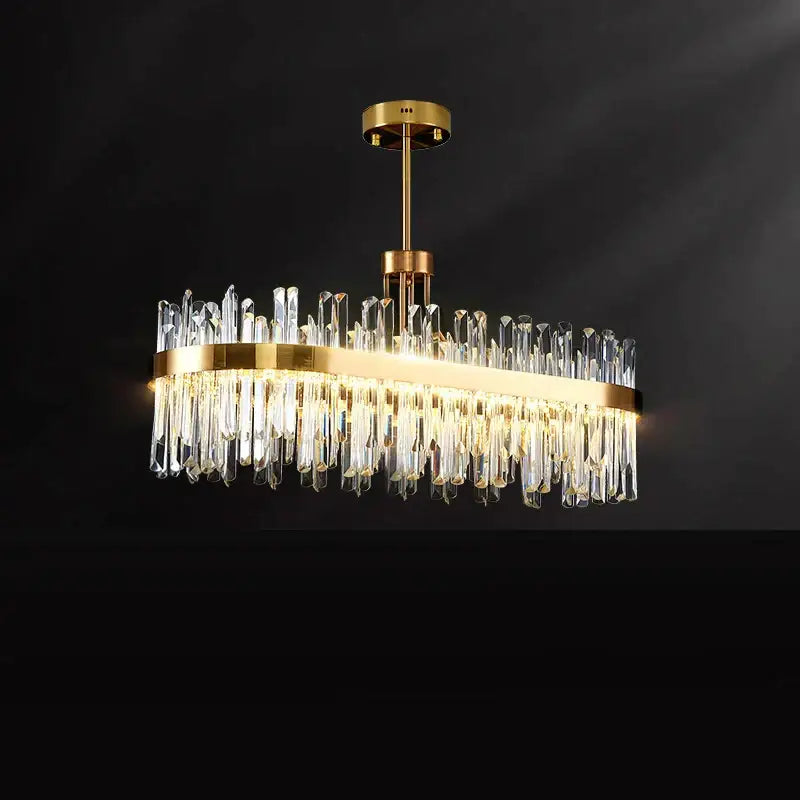 Luxury gold decorbites crystal chandeliers with clear crystal prisms and a modern frame for dining room lighting
