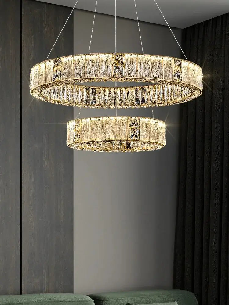 Luxury gold decorbites crystal glass chandelier with gold-toned double-ring and cascading crystal prisms for living room light
