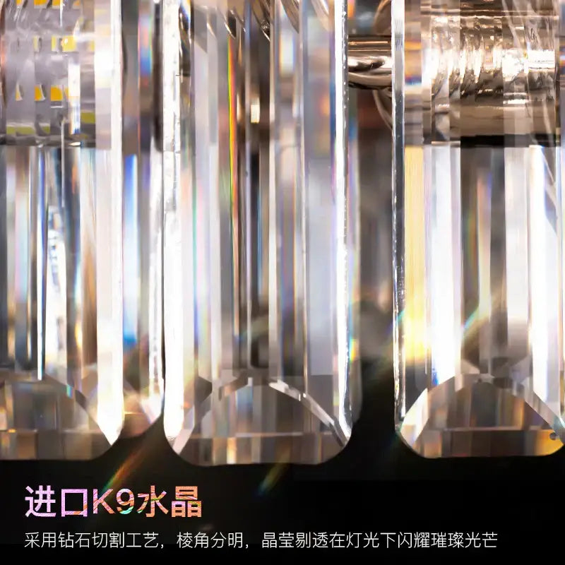 Clear faceted k9 crystal prisms with sharp edges on a luxury gold decorbites crystal ring chandelier for dining room