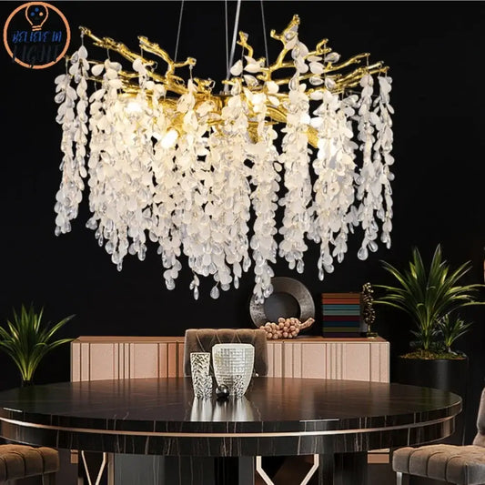 Elegant gold-toned decorbites grape crystal chandelier with cascading white crystal leaves for dining room light