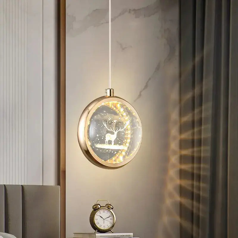 Luxury gold deer crystal ball chandelier pendant light features a glowing deer silhouette inside a translucent sphere