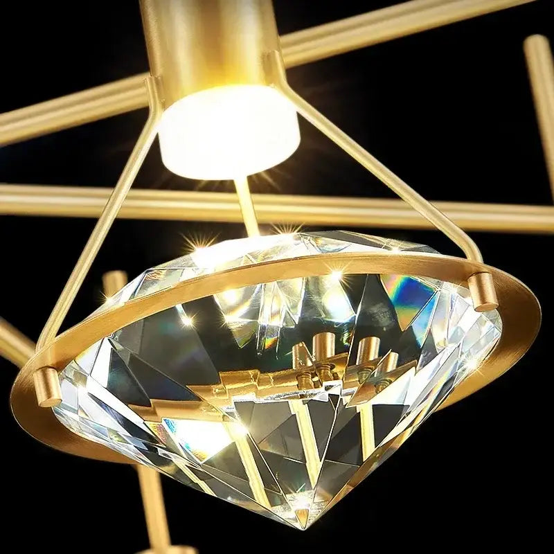 Luxury gold diamond crystal wall lamp featuring a faceted centerpiece refracting light in vibrant rainbow hues