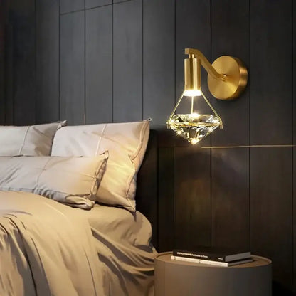Luxury gold diamond crystal wall lamp featuring a faceted crystal diamond-shaped lampshade for living room use