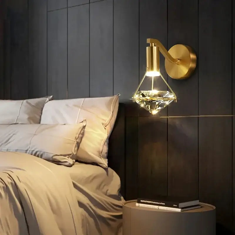 Luxury gold diamond crystal wall lamp featuring a faceted crystal diamond-shaped lampshade for living room use