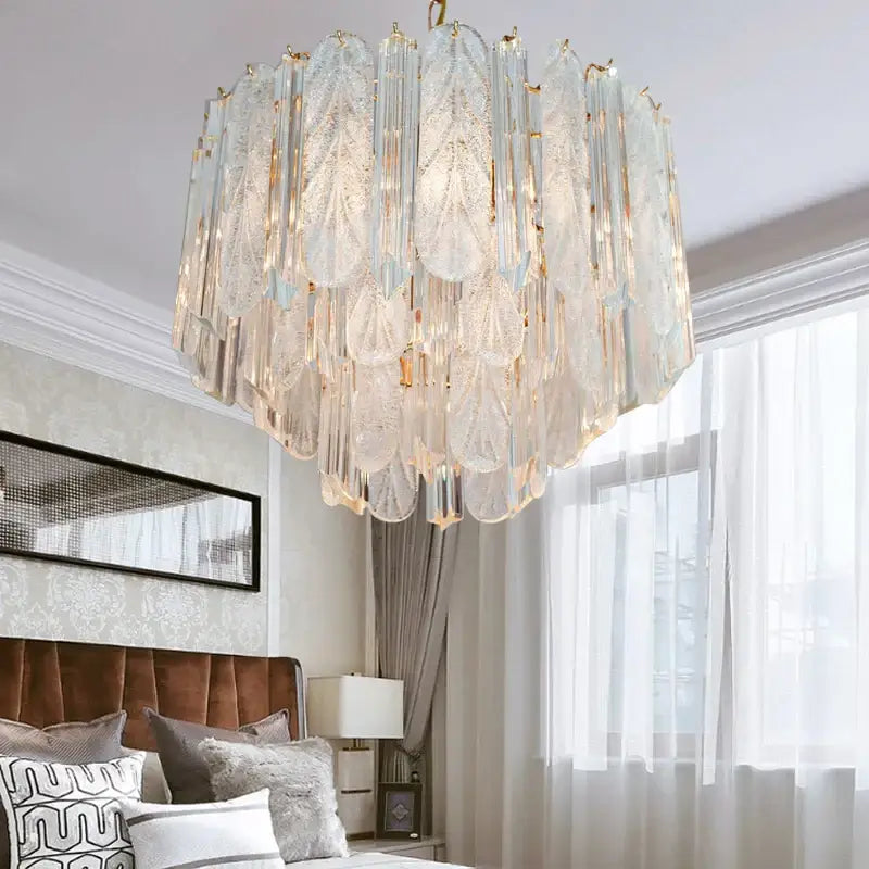 Elegant luxury gold leaf crystal bedroom pendant lamp featuring leaf-shaped glass panels and gold-toned accents decorbites crystal bedroom