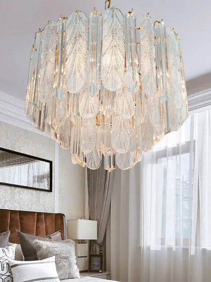 Luxury gold leaf crystal bedroom pendant lamp with multi-tiered cascading translucent glass panels and gold accents