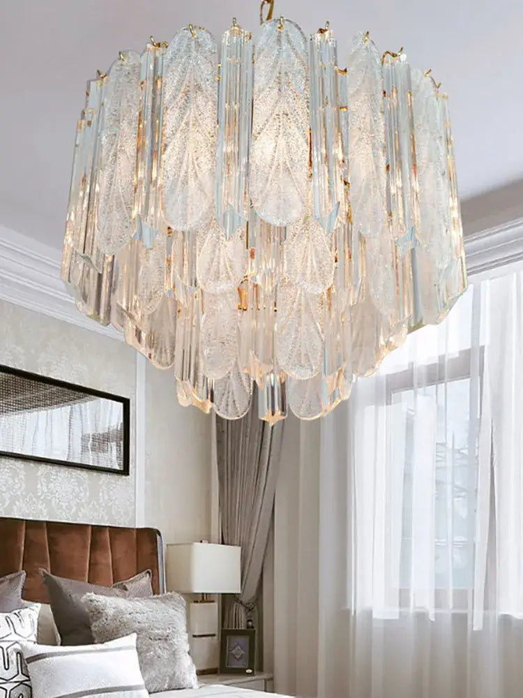 Luxury gold leaf crystal bedroom pendant lamp with multi-tiered cascading translucent glass panels and gold accents