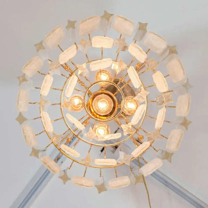 Luxury gold leaf crystal bedroom pendant lamp featuring a circular gold-toned design with frosted glass shades decorbites crystal bedroom pendant