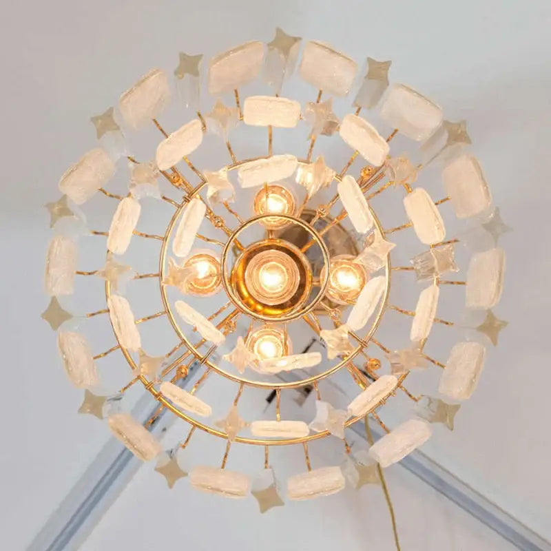 Luxury gold leaf crystal bedroom pendant lamp featuring a circular gold-toned design with frosted glass shades decorbites crystal bedroom pendant
