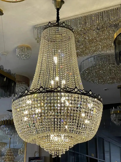 Luxury gold multi tier crystal led chandelier with black wrought iron frame and clear faceted crystals by decorbites crystal led