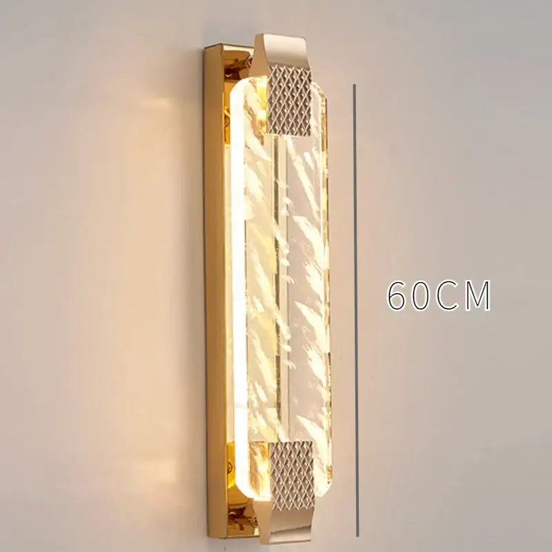 Luxury gold rectangular crystal wall lamp with clear panels and textured metallic accents for bedroom decorbites crystal wall lamp