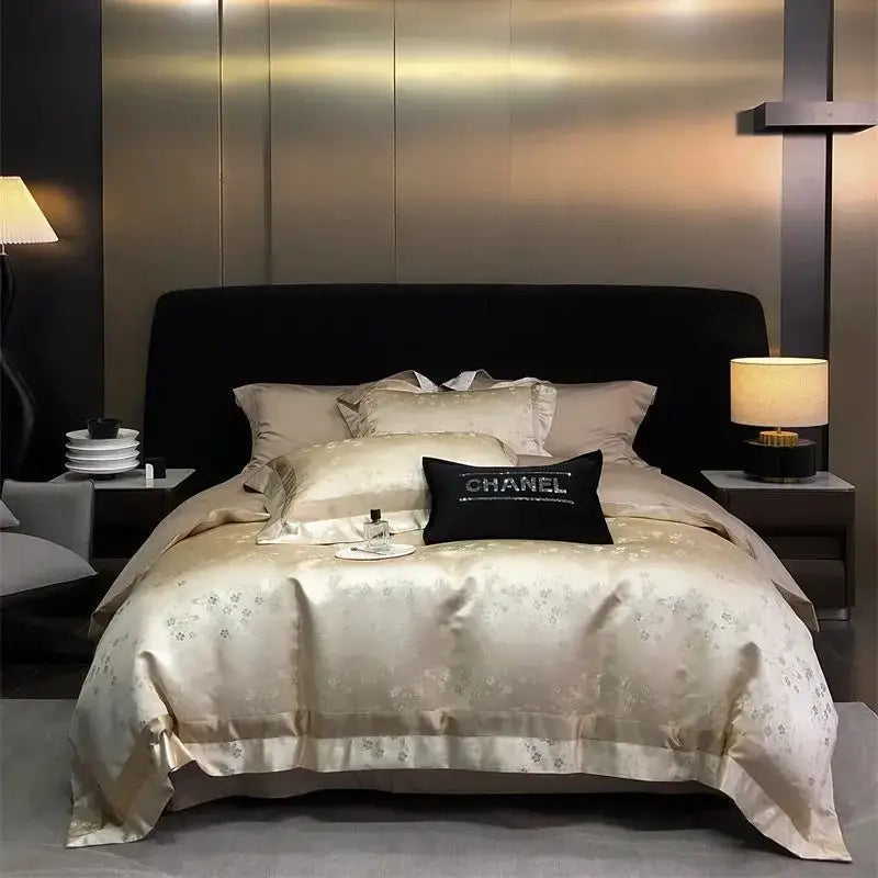 Luxury gold and silver brocade satin jacquard bedding set cream with subtle floral embroidery and black Chanel pillow