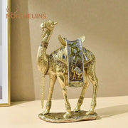 Luxury gold and silver camel resin art ornament with intricate detailing and silver-toned palm tree saddle for decor
