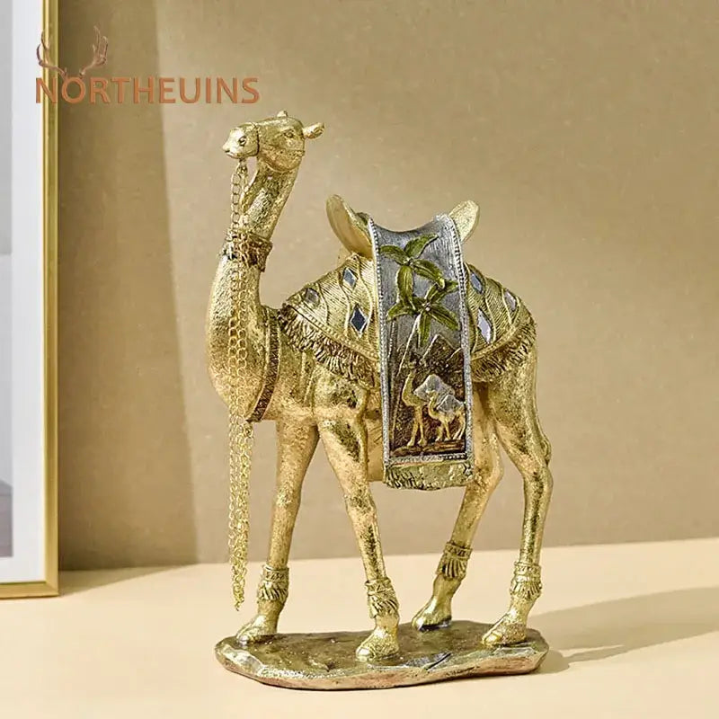 Luxury gold and silver camel resin art ornament with intricate detailing and silver-toned palm tree saddle for decor