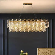 Luxury decorbites gold steel crystal pendant chandelier with gold-toned rectangular frame and cascading clear prisms