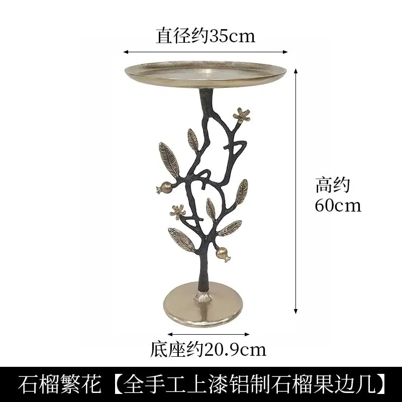 Luxury golden brass bird tree side table with an antique silver finish and decorative leaves pomegranates base by decorbites brass bird