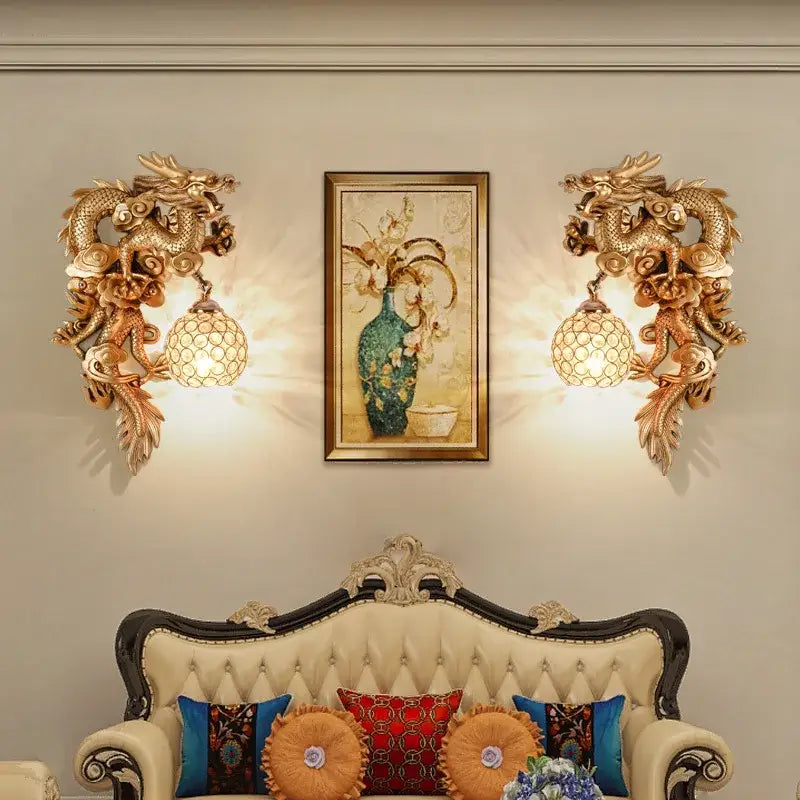 Luxury golden dragon phoenix wall light with intricate dragon phoenix wall design and warm glowing glass sconce decorbites dragon phoenix