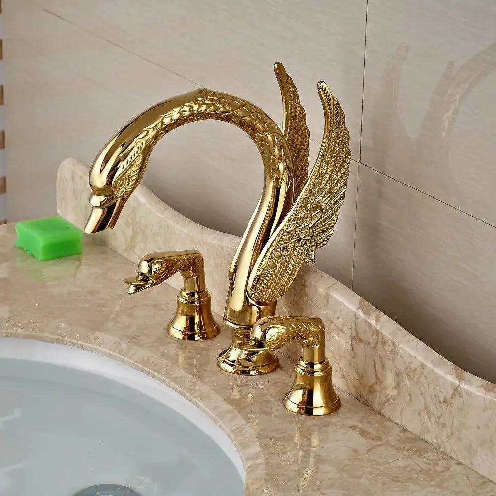 Luxury golden swan dual handle bathroom faucet with polished metallic finish and intricate feather detail by decorbites golden swan