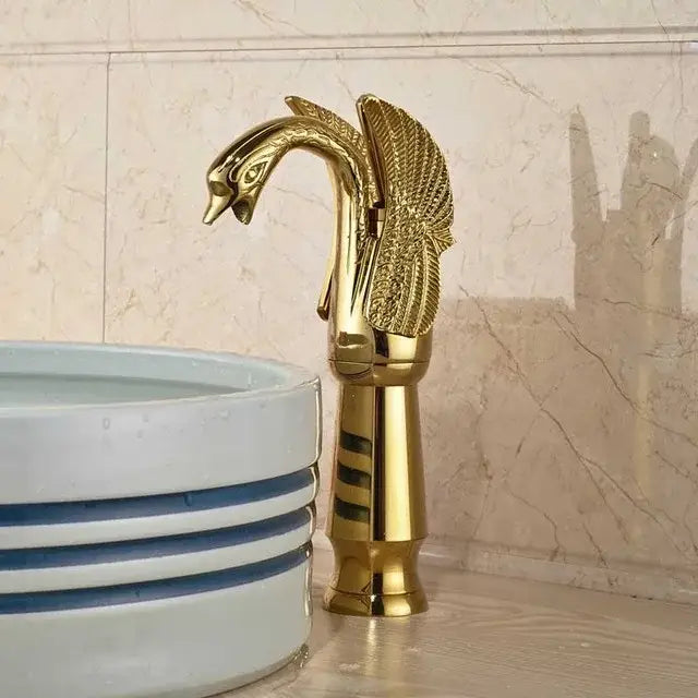 Luxury golden swan dual handle bathroom faucet with decorbites golden swan feather detail and polished metallic finish