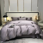 Luxury gray satin four-piece egyptian cotton bedding set with matching pillowcases and plush duvet cover
