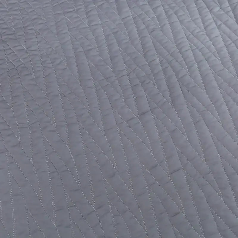 Luxury gray quilt set featuring a diagonal stitching pattern in textured egyptian cotton for bedroom bedding