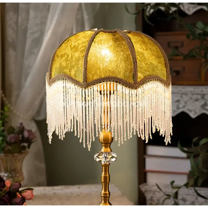 Luxury green velvet tasseling lampshade with golden velvet beaded fringe and brass accents for elegant decorbites green velvet decor