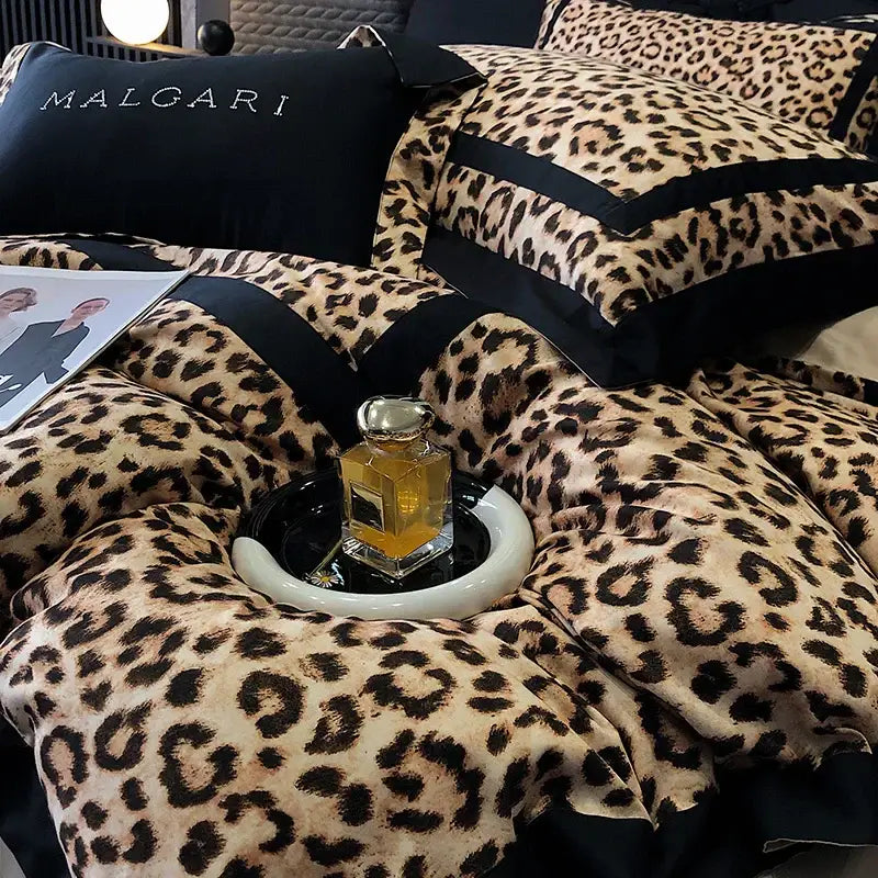 Luxury leopard print lyocell cotton bedding set with black satin trim and malgari branded pillow decorbites leopard print