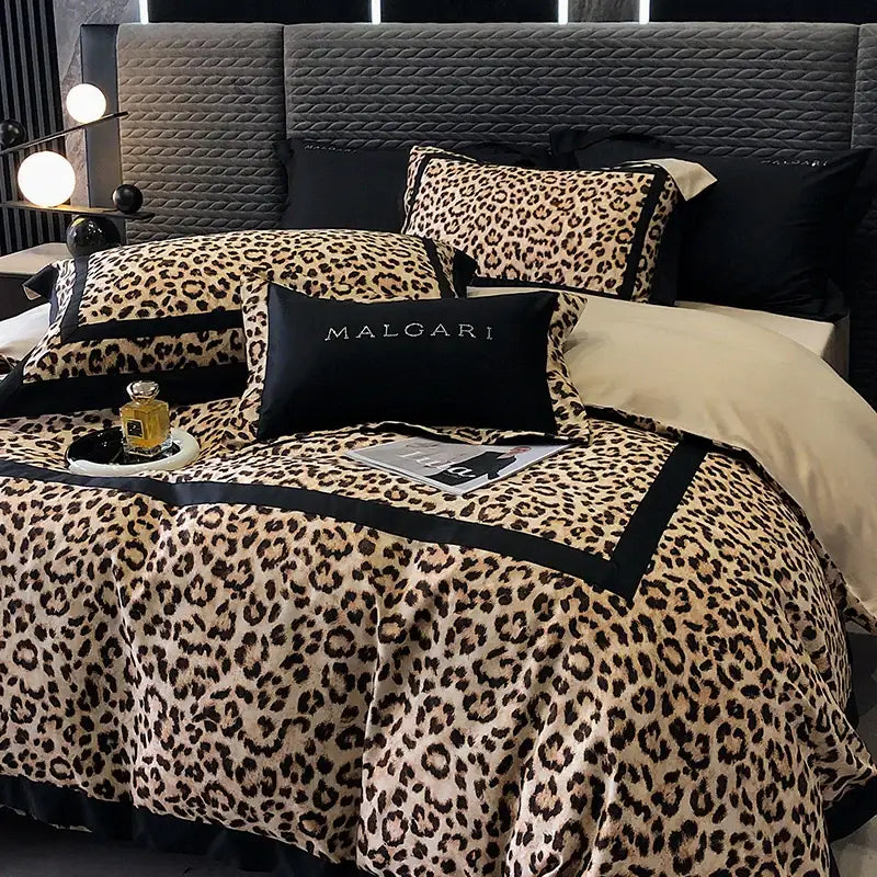 Luxury leopard print lyocell cotton bedding set with black trim and malgari embroidered pillow by decorbites