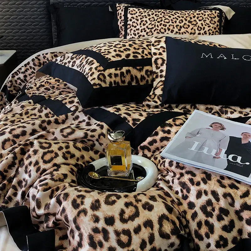Luxury leopard print lyocell cotton bedding set with black satin trim and matching pillows by decorbites leopard print