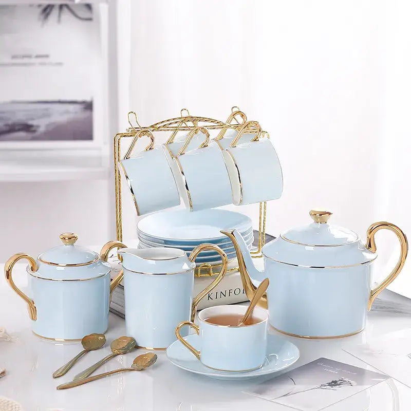 Luxury light blue bone china coffee set with gold-trimmed handles and rack for elegant dining room decorbites bone china