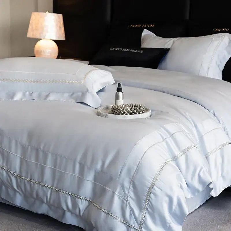 Light blue satin duvet cover with delicate silver embroidery edges in decorbites light champagne luxury bedding set Egyptian cotton
