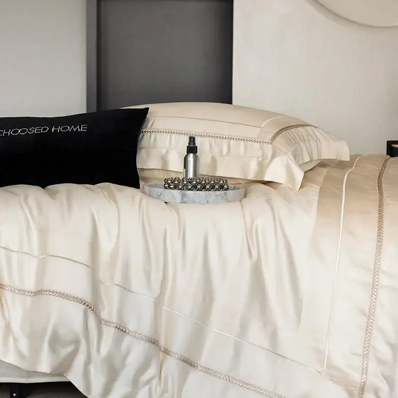 Cream-colored satin bedding set with delicate silver chain embroidery in light champagne luxury egyptian cotton decorbites