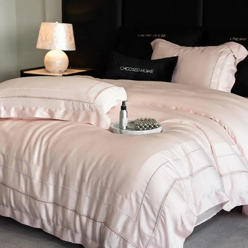 Pink satin bedding set with subtle beaded trim in decorbites light champagne luxury egyptian cotton embroidery