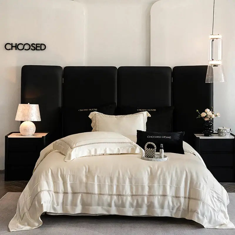 Luxury light champagne bedding set in cream-colored Egyptian cotton satin with subtle embroidery and matching pillows