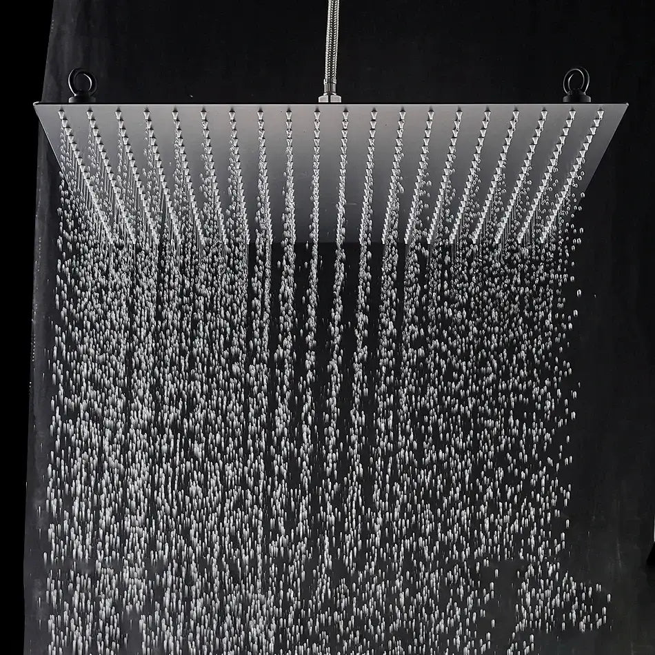 Luxury matte black rainfall shower head with square brushed stainless steel design delivering premium shower experience