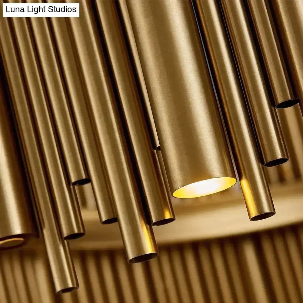 Modern brass tube pendant light with warm glowing illumination in luxury modern round gold chandelier for living room