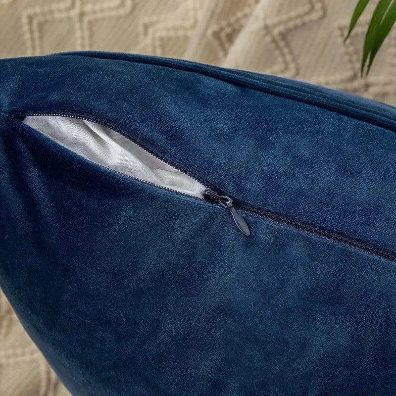 Deep blue velvet stripe pillow cover with zipper closure showing white interior lining for living room decorbites pillow covers
