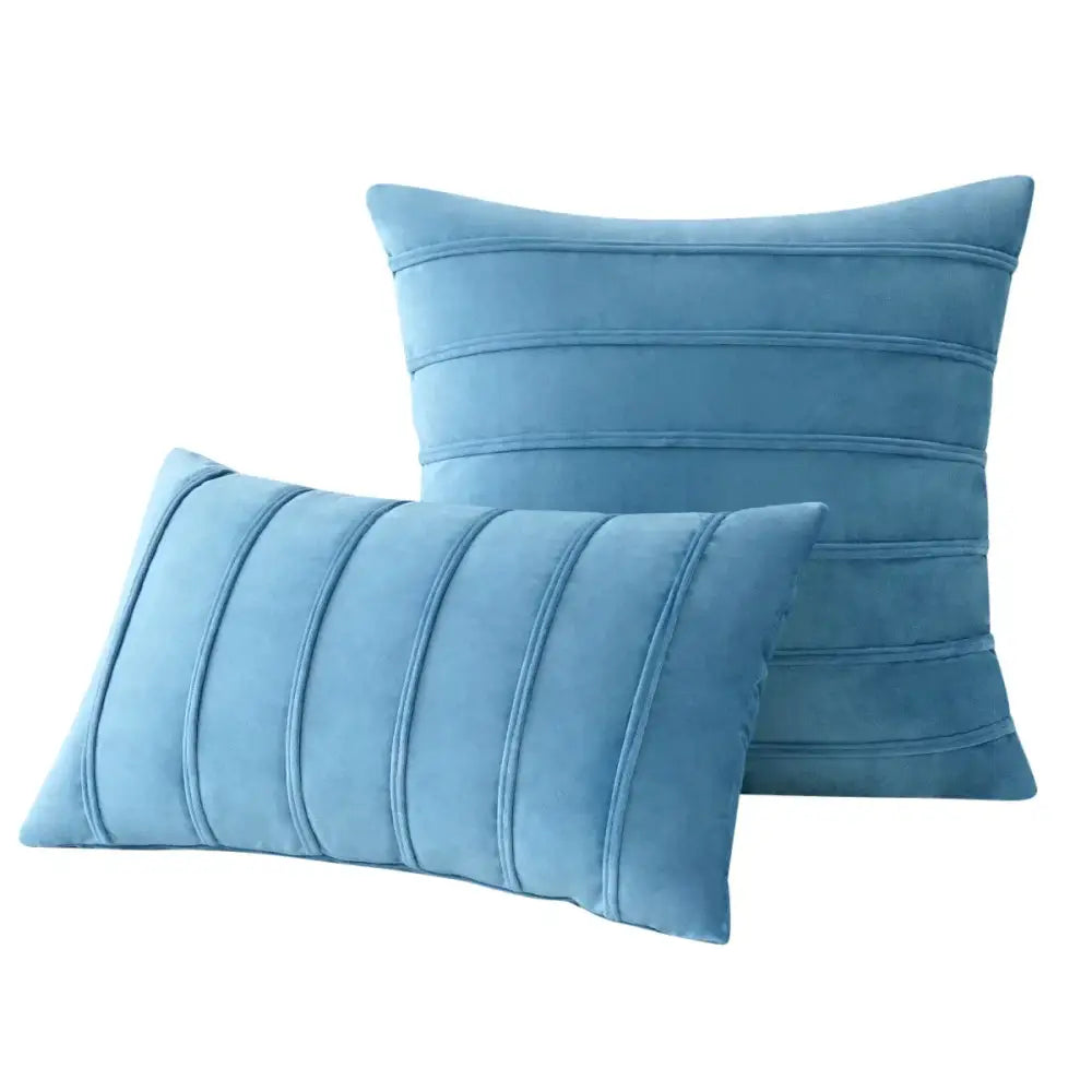 Set of two light blue velvet pillow covers with vertical blue velvet stripe design for luxury living room decorbites