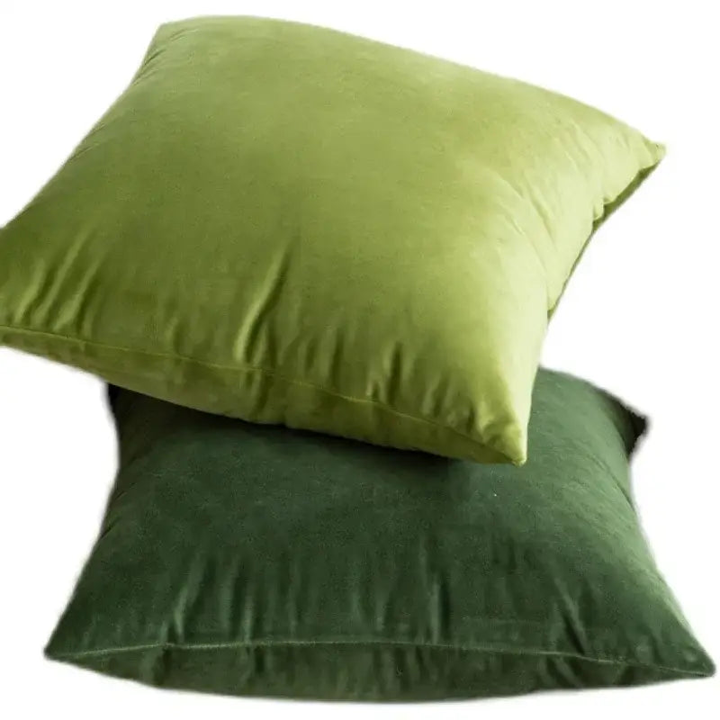 A plush olive green velvet pillow case with soft texture and clean stitched edges for decorbites green velvet living room decor
