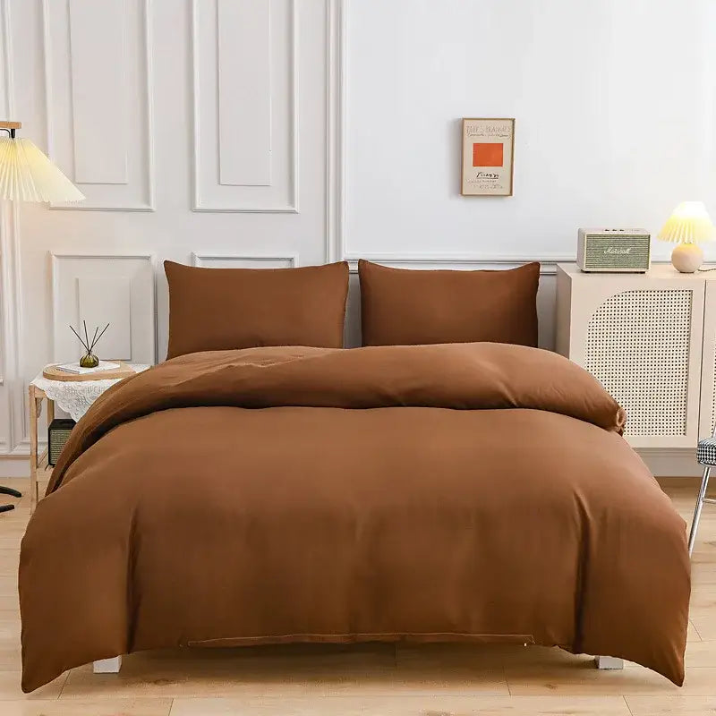 Luxury orange and gray duvet cover set with warm brown duvet and matching pillowcases in soft smooth fabric finish