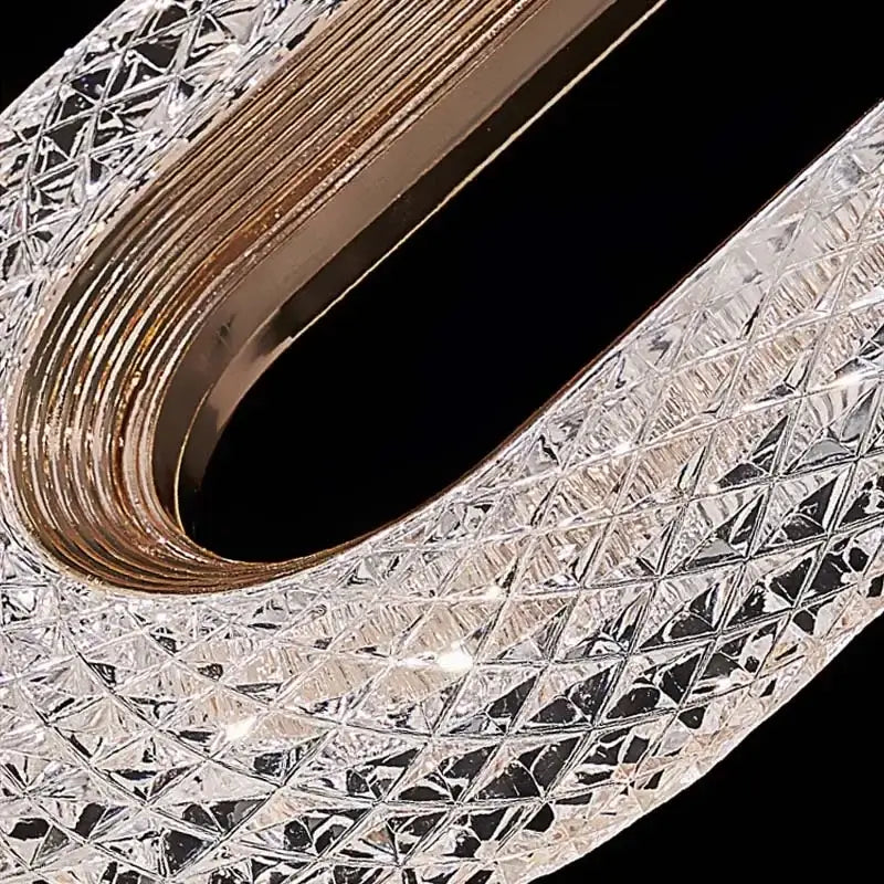 Luxury oval gold decorbites crystal rings chandelier with sleek curved design and intricate diamond-cut facets for staircase lighting