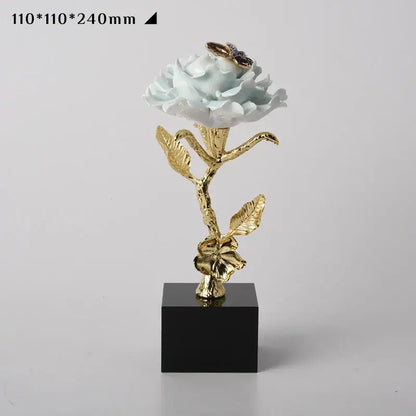 Luxury porcelain crystal rose decor in light blue and gold with butterfly on black base for living room display