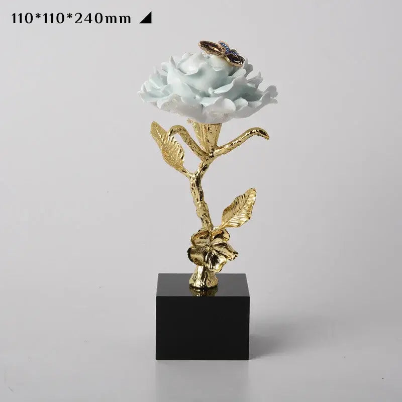 Luxury porcelain crystal rose decor in light blue and gold with butterfly on black base for living room display