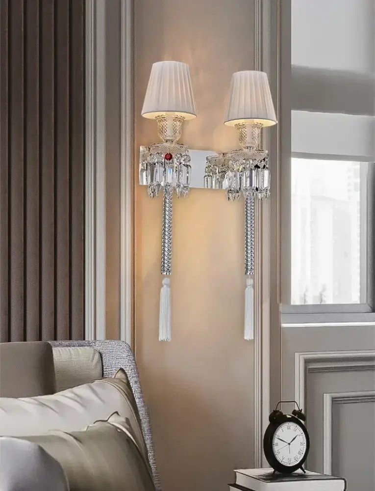Elegant luxury silver crystal wall lamp with cream pleated shades and dangling tassels for bedroom decorbites crystal wall lamp